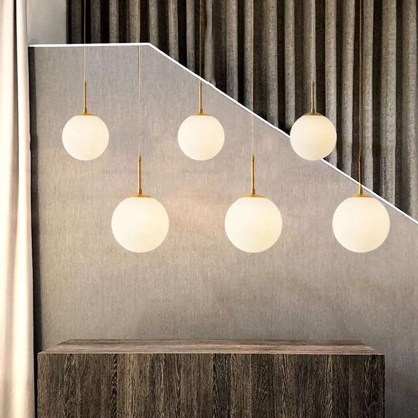 Setthis Modern Globe Pendant Light SetThis modern globe pendant light set feat ...