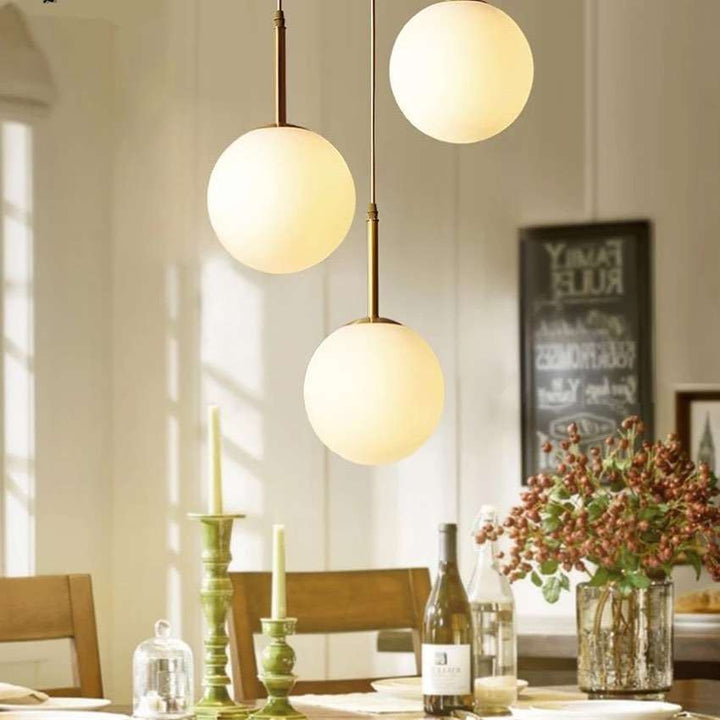 Setthis Modern Globe Pendant Light SetThis modern globe pendant light set feat ...