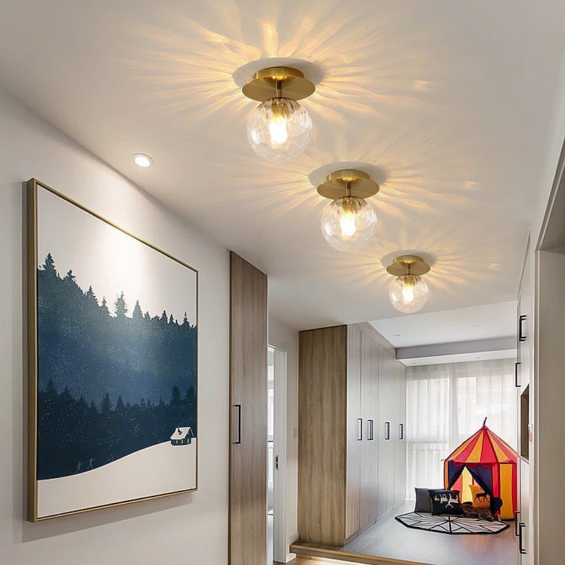 Modern Brass Ceiling Light with Frosted Glass Globe