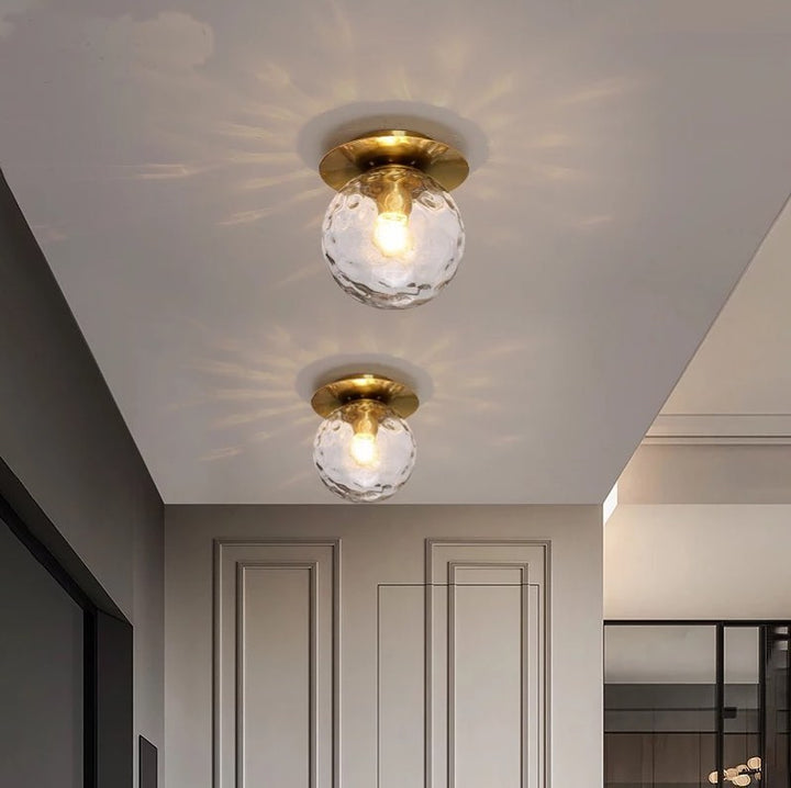 Modern Brass Ceiling Light with Frosted Glass Globe