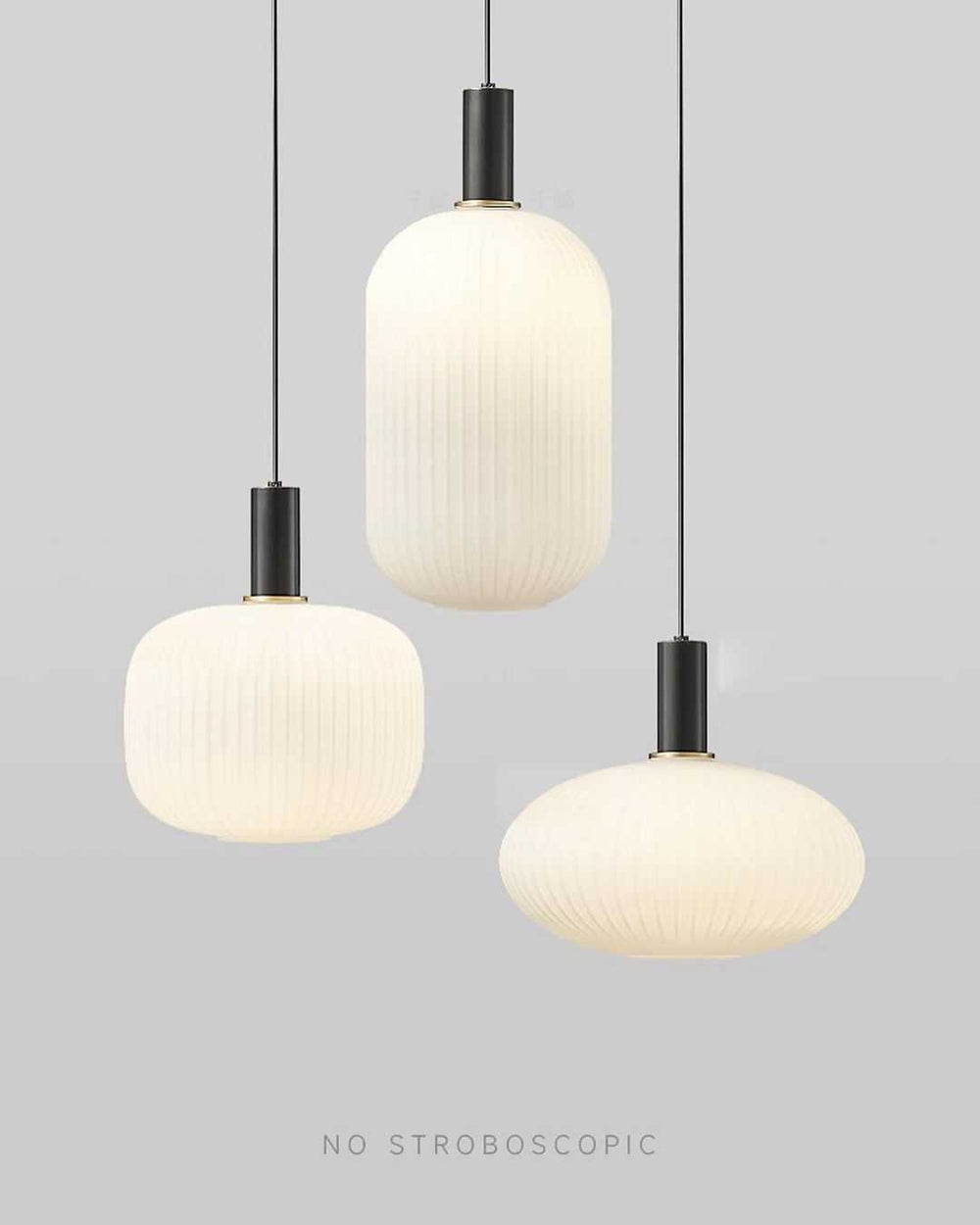 Frosted Glass Pendant LightElegant Frosted Glass Pendant Light TrioBring a touch of elegance to your space with this trio of frosted glass pendant lights. The delicate ribbed glass design diffuses light beautifully, creating a warm,Pendant LightingWadi Home