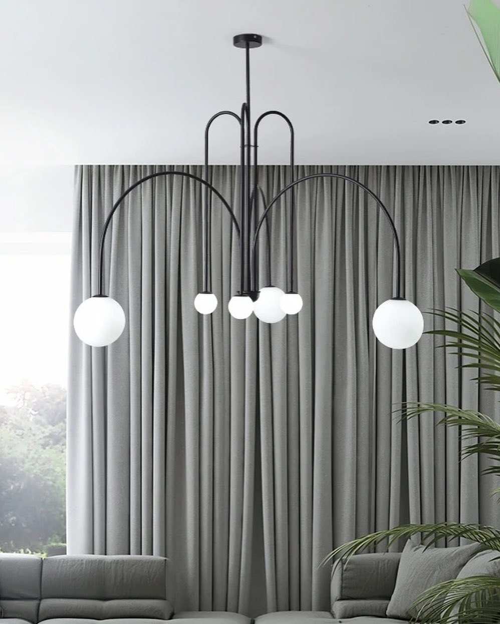 Modern Dining Room ChandelierModern Dining Room ChandelierSleek and modern dining room chandelier with spherical globes, perfect for contemporary interiors.ChandeliersWadi Home