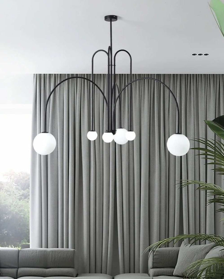 Modern Dining Room ChandelierModern Dining Room ChandelierSleek and modern dining room chandelier with spherical globes, perfect for contemporary interiors.ChandeliersWadi Home