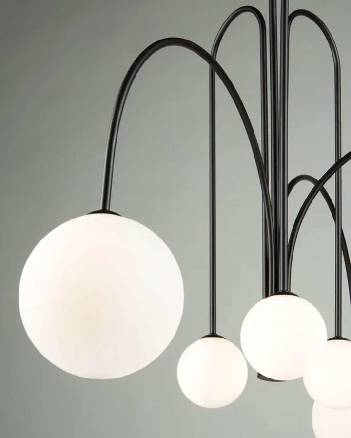 Modern Dining Room ChandelierModern Dining Room ChandelierSleek and modern dining room chandelier with spherical globes, perfect for contemporary interiors.ChandeliersWadi Home