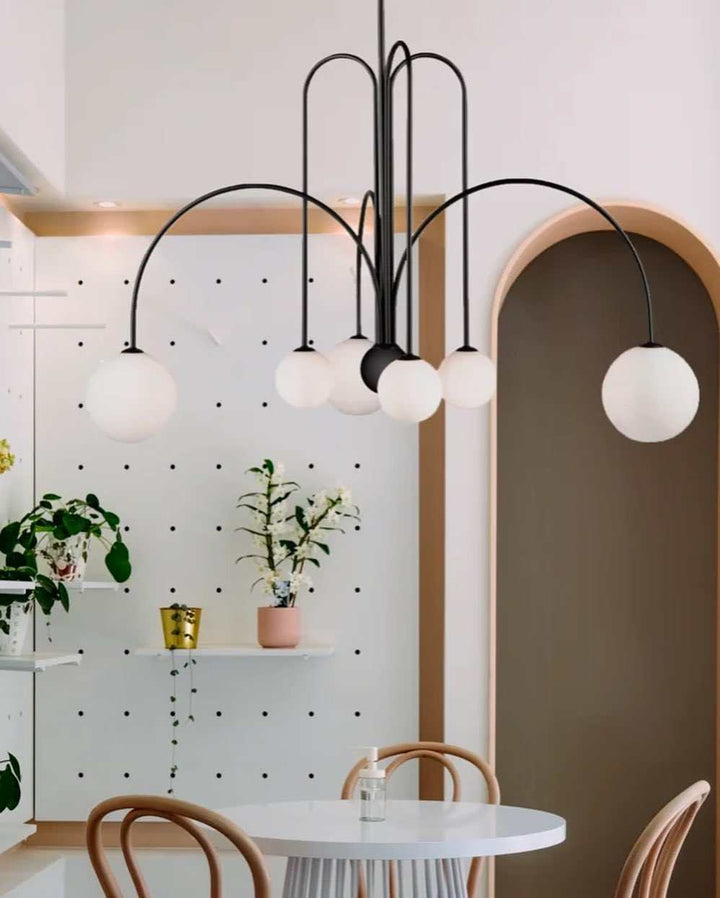 Modern Dining Room ChandelierModern Dining Room ChandelierSleek and modern dining room chandelier with spherical globes, perfect for contemporary interiors.ChandeliersWadi Home