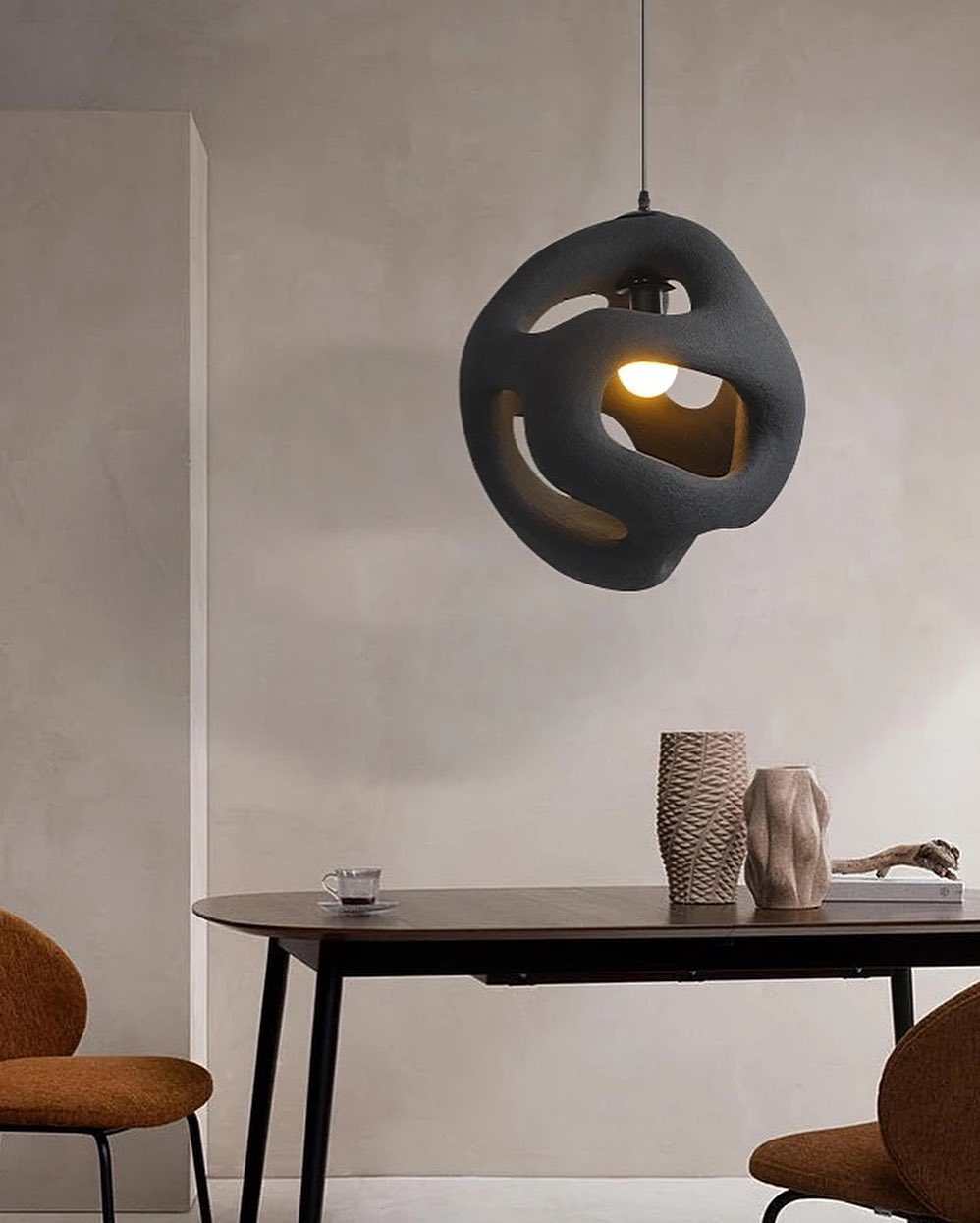 Abstract Artistic Pendant LightAn abstract artistic pendant light that ...