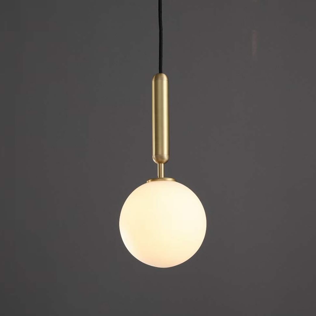 Modern Brass Pendant Light with Globe Shade