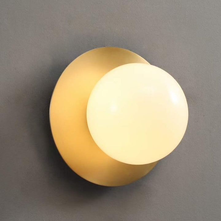 Modern Brass Wall Light with Circular Globe Shade