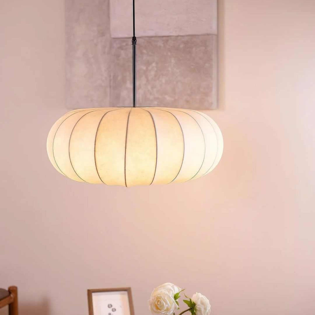 Minimalist linen pendant light providing soft ambient lighting for minimalist interiors