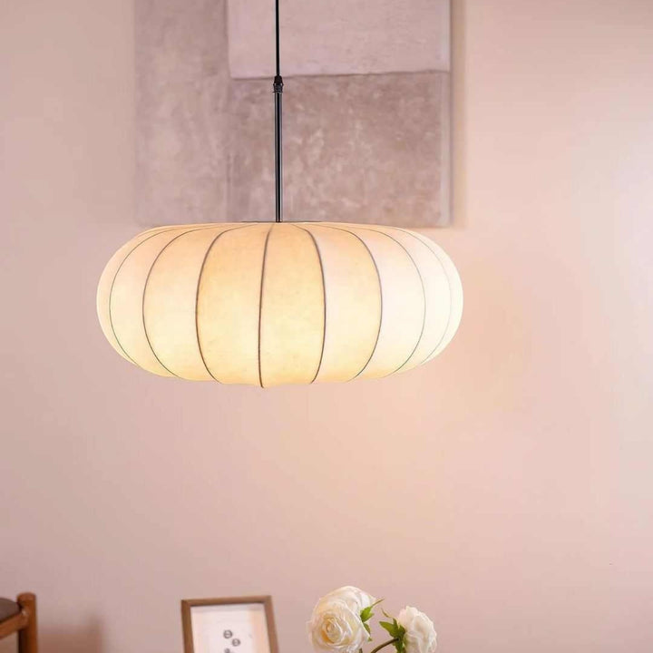 Minimalist linen pendant light providing soft ambient lighting for minimalist interiors
