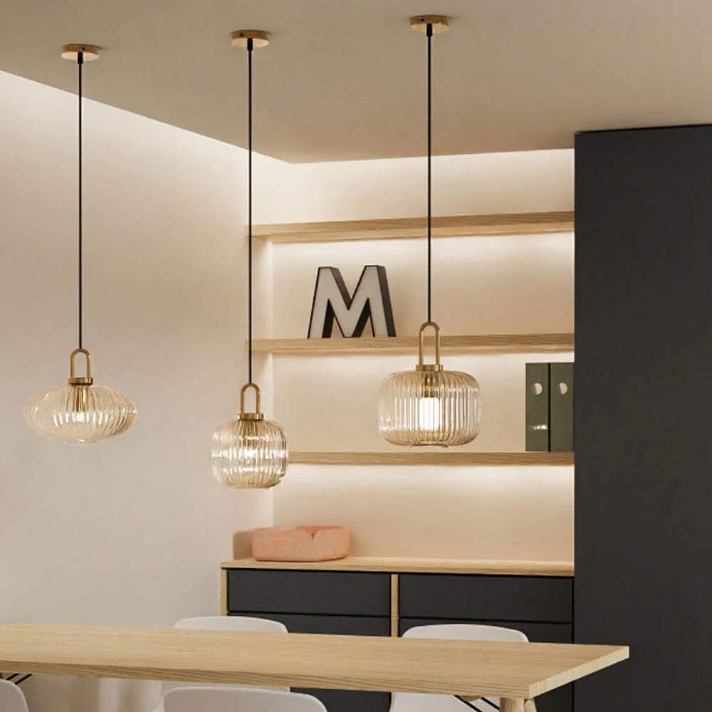 Setthis Modern Ribbed Glass Pendant Light SetThis set of modern pendant lights ...