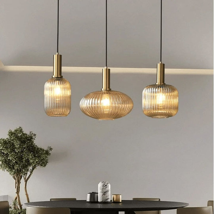 Modern Brass and Ribbed Glass Pendant Light Trio