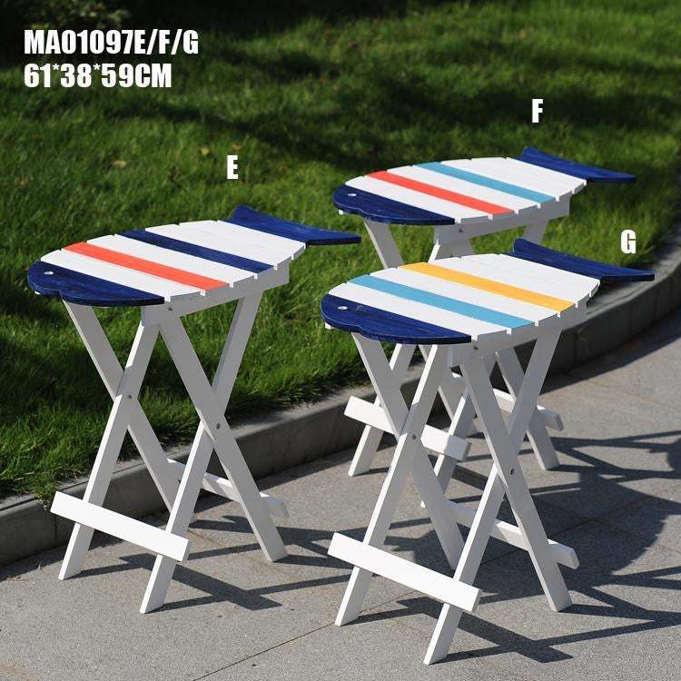Compact folding surfboard style wooden table for outdoor use