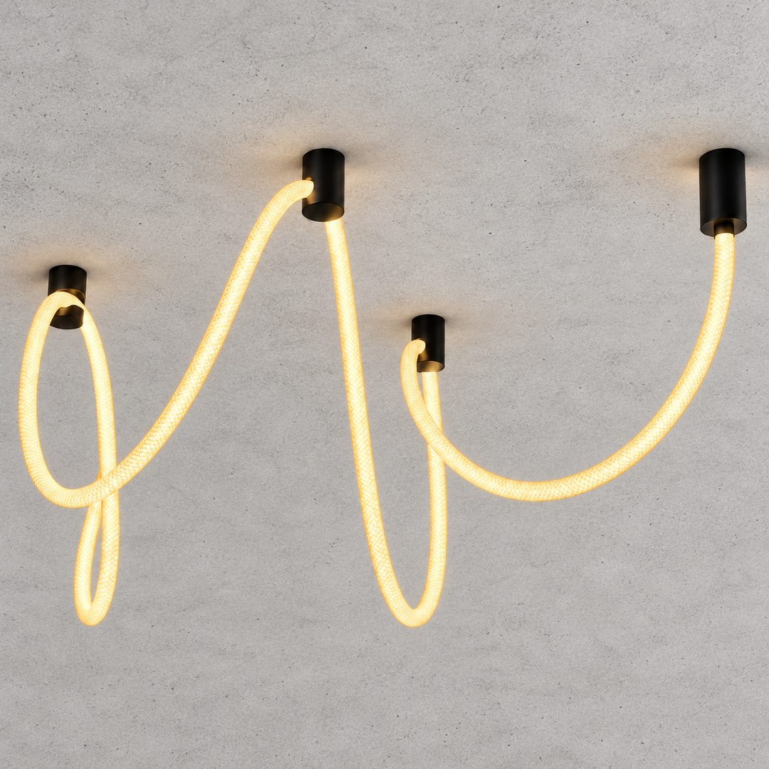 Modern sculptural wall light with flexible warm-gold LED tubes and black cylindrical mounts