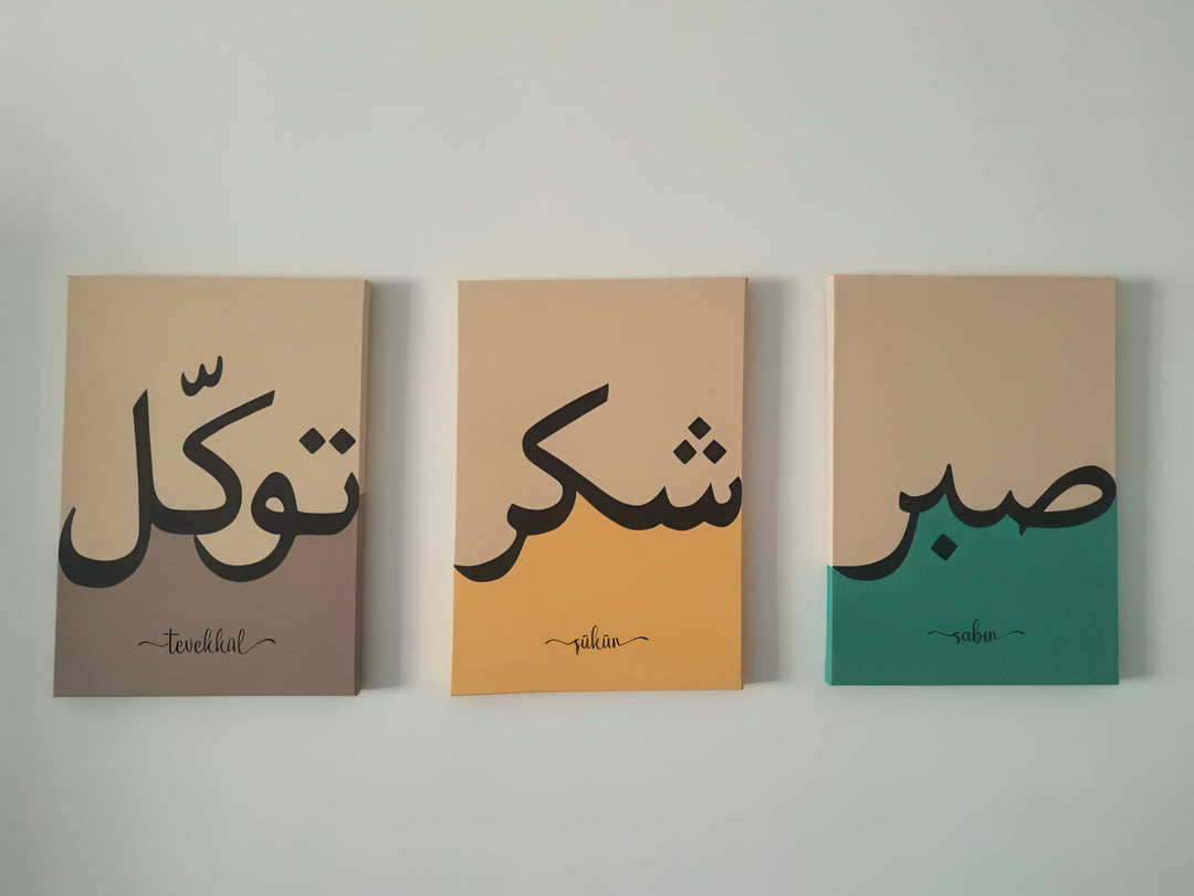 Set of three Arabic values canvases with calligraphy in earthy tones, framed in MDF with glass front