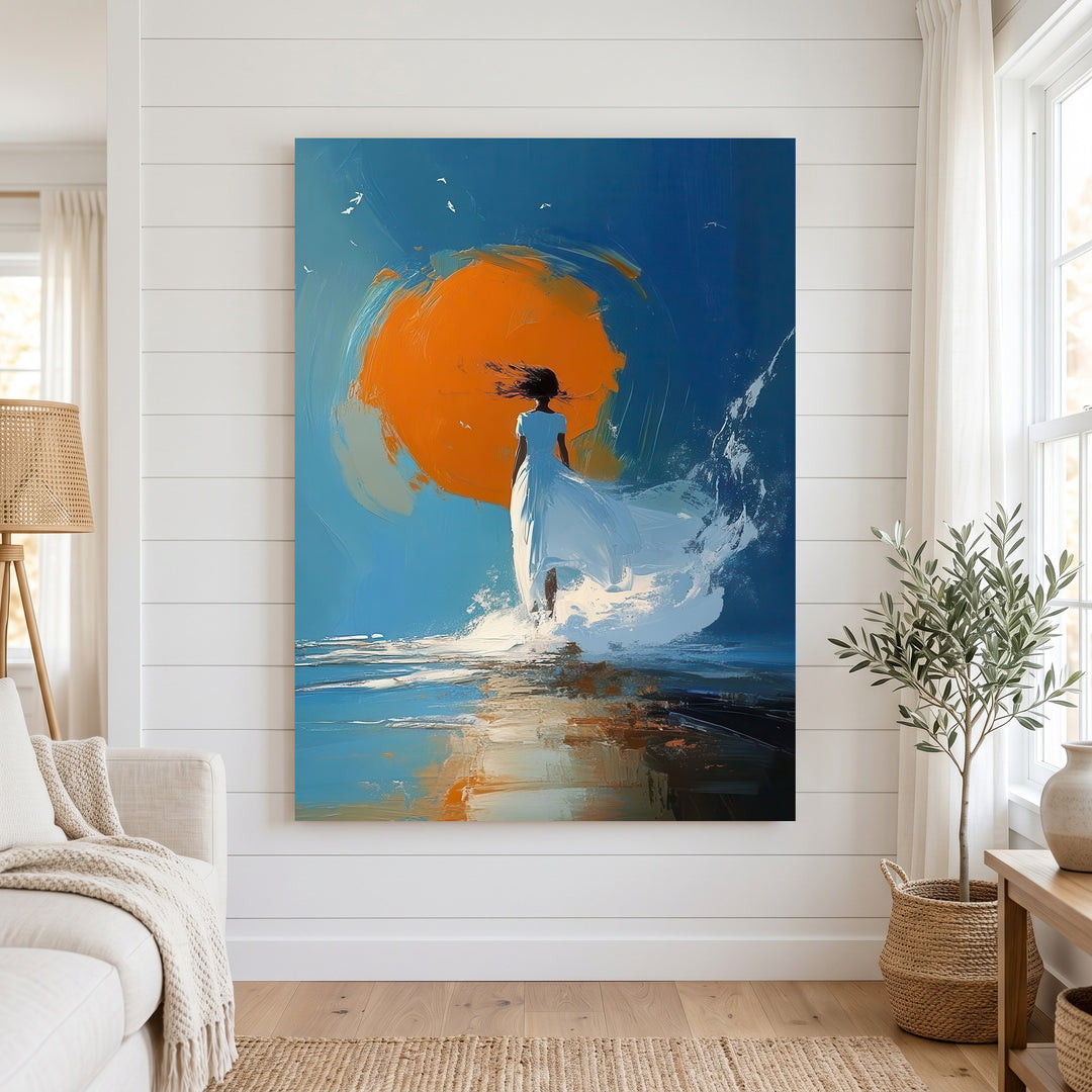 Woman walking in shallow water at sunset on canvas artwork with MDF frame