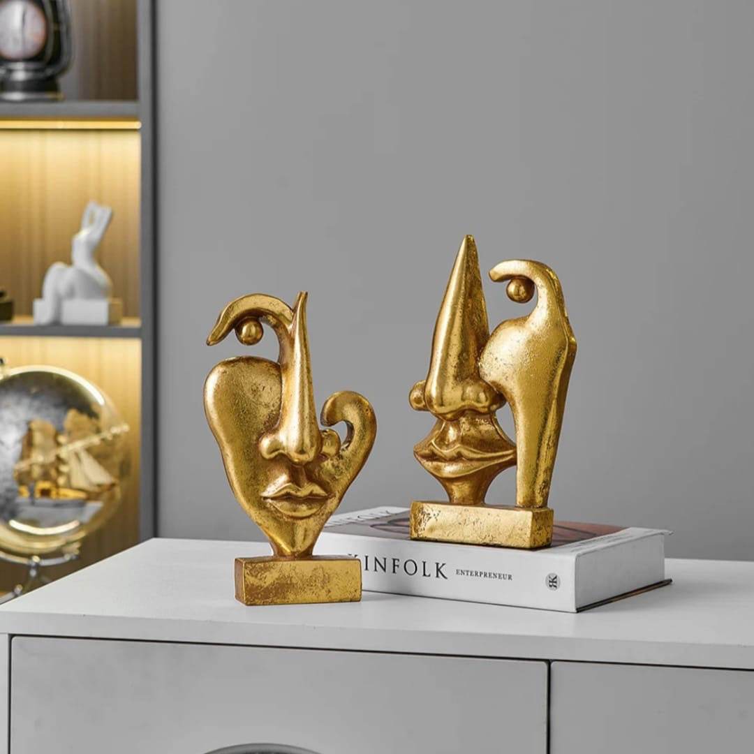 Abstract Gold Face Sculptures