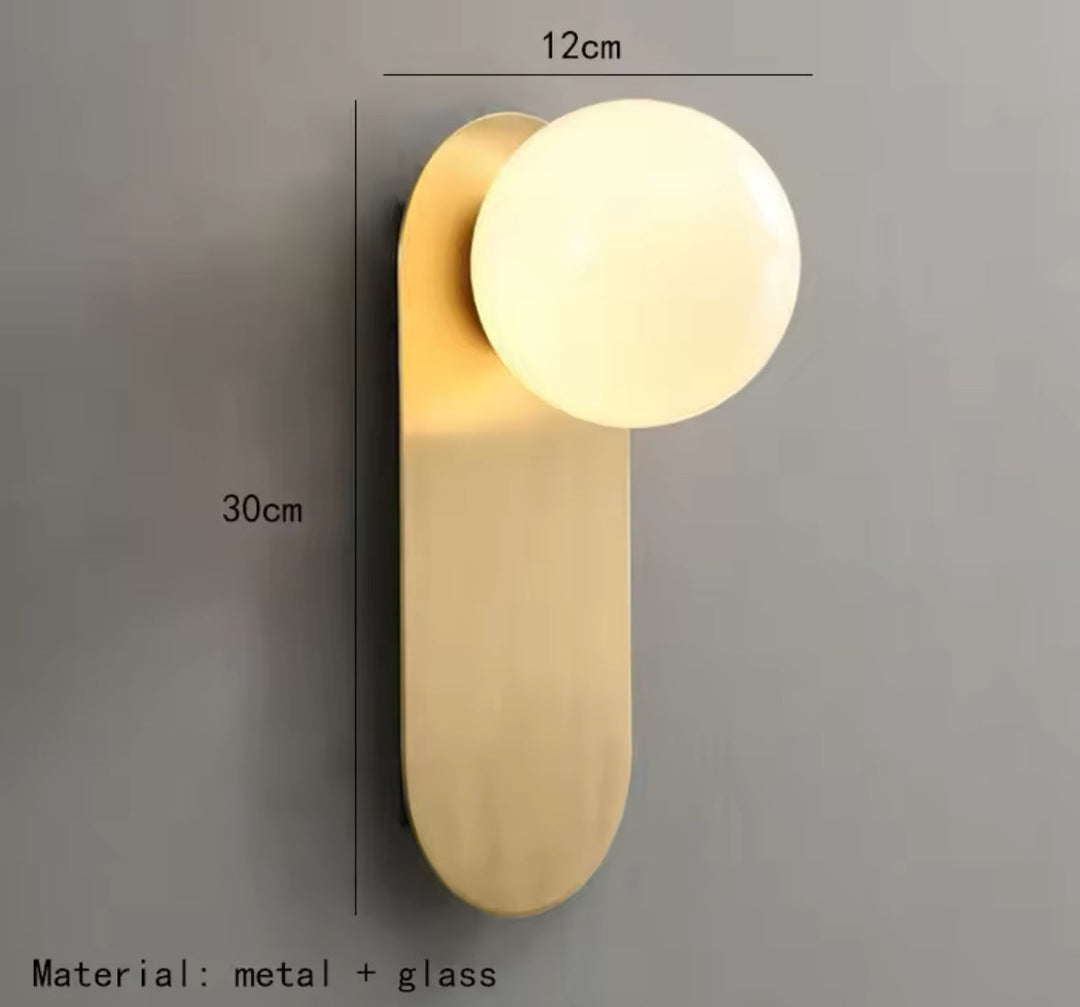 Modern Minimalist Wall Light with Soft Gold Base and Globe Shade