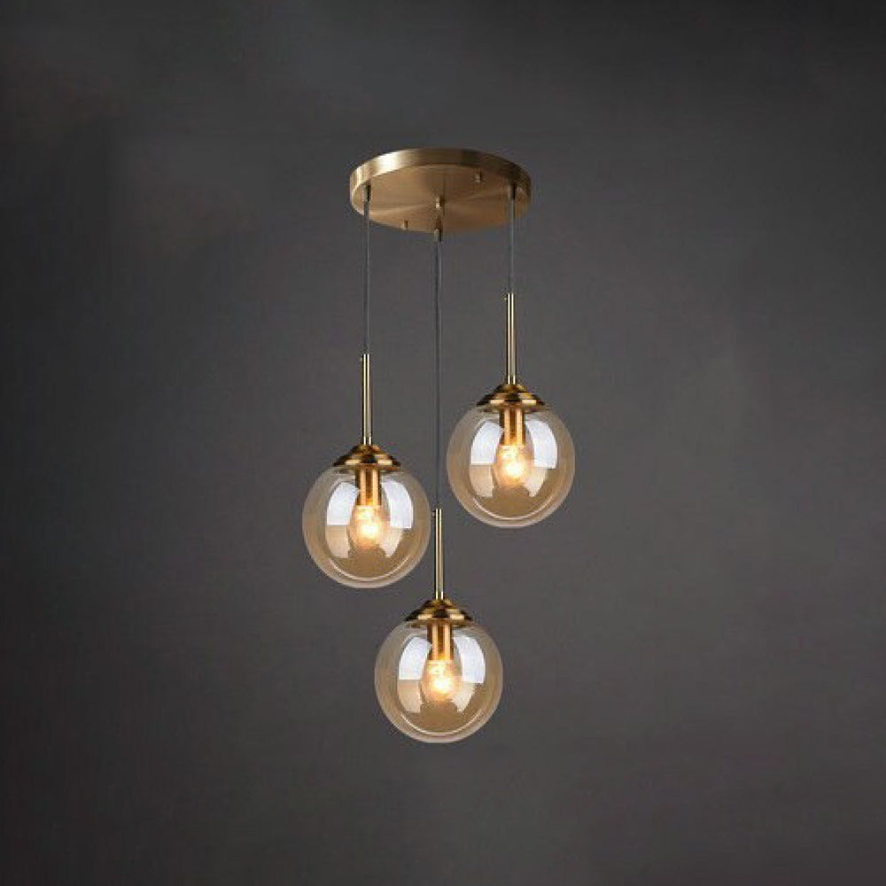 Modern 5-Light Globe Pendant Light with Smoked Glass and Brass Finish