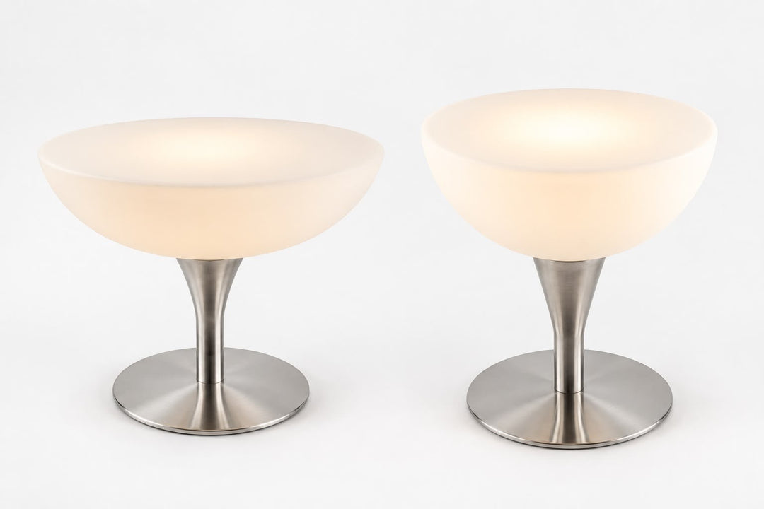 Modern white bowl-shade table lamp with a silver metallic stem and round base