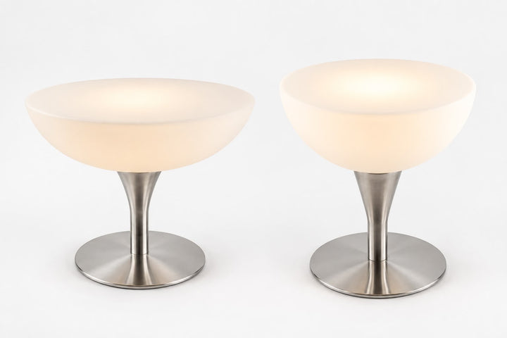Modern white bowl-shade table lamp with a silver metallic stem and round base