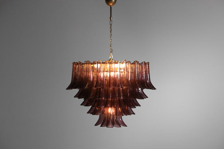 Smoky amber glass cascade chandelier with layered ribbed shades and warm illumination