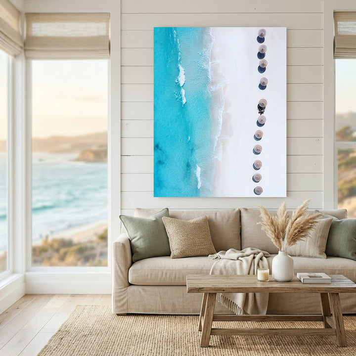 Aerial view of beach umbrellas on turquoise ocean shore canvas wall art