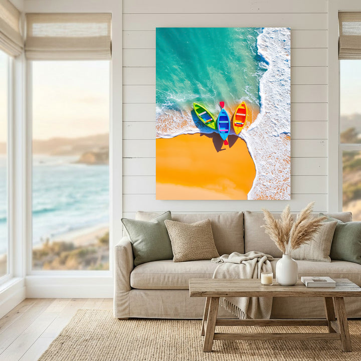Aerial view of three colorful kayaks on golden sandy beach with turquoise waves, vibrant canvas art