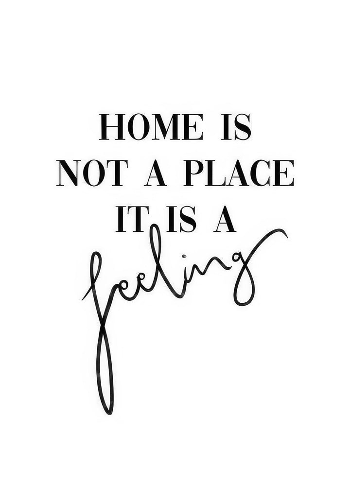 Home Is Not a Place It Is a Feeling Quote Canvas with minimalist black typography on neutral background in MDF frame