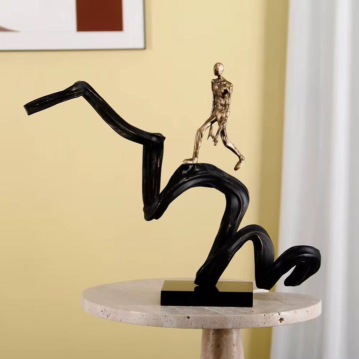 Abstract Walking Figure on Wave Sculpture