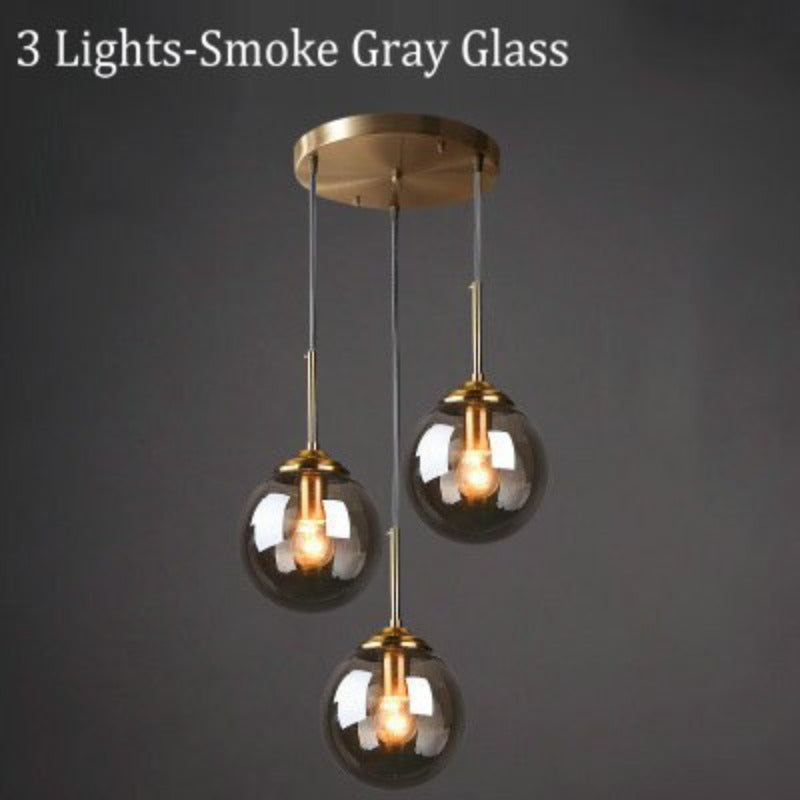 Modern 5-Light Globe Pendant Light with Smoked Glass and Brass Finish