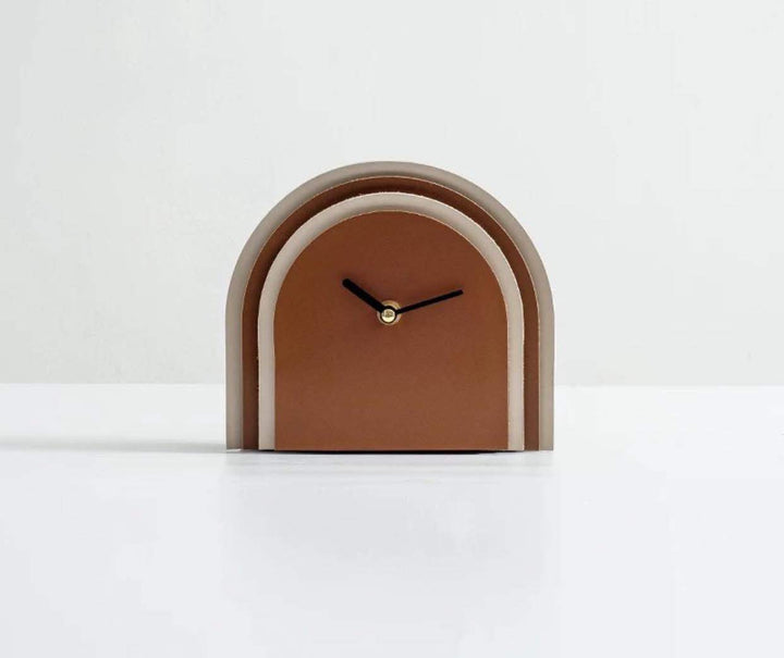 Modern Arc clock with sleek minimalist design on white background