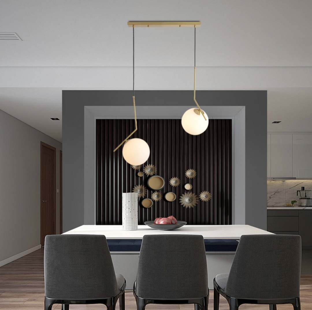 Modern Three-Globe Pendant Light with Brass Finish