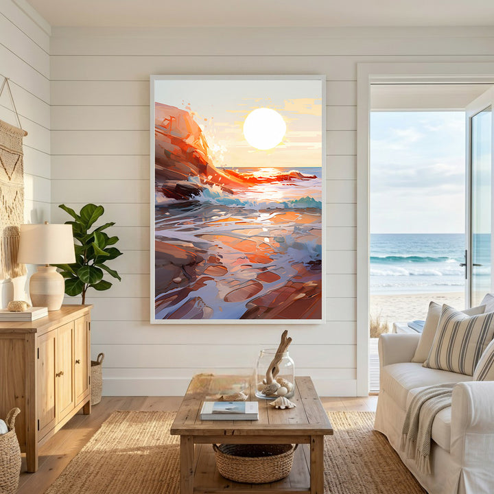 Wadi Home coastal sunset artwork with orange, yellow, and blue hues over a rocky shoreline and crashing waves.