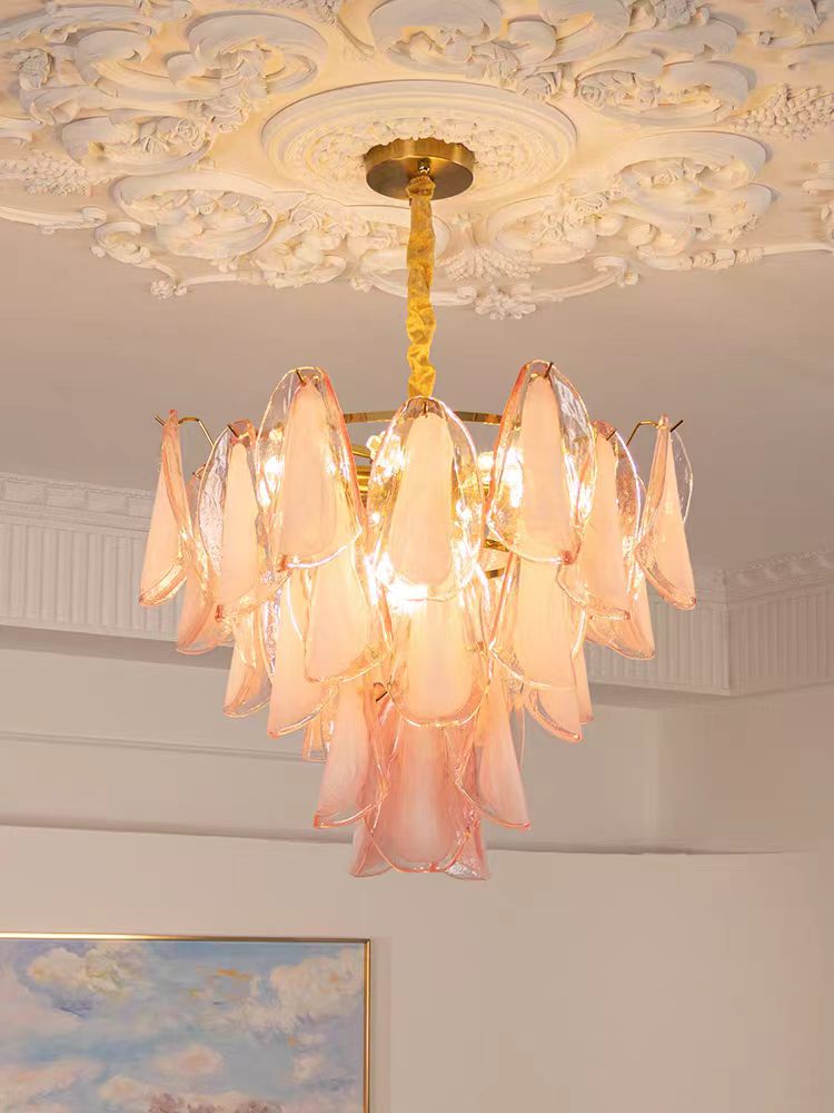 Chandelier with layered translucent pink glass petal shades and a gold-tone stem