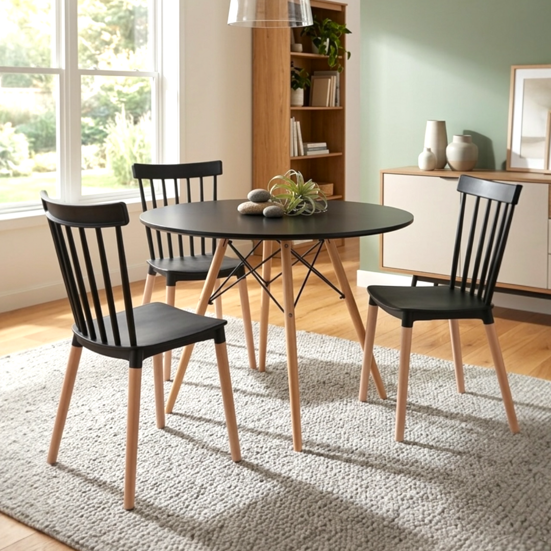 Modern dining table set with round MDF tabletop and three spindle-back acrylic chairs with beech wood legs