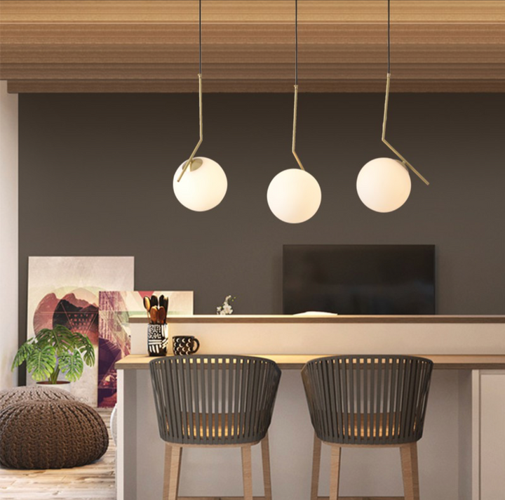 Modern Three-Globe Pendant Light with Brass Finish