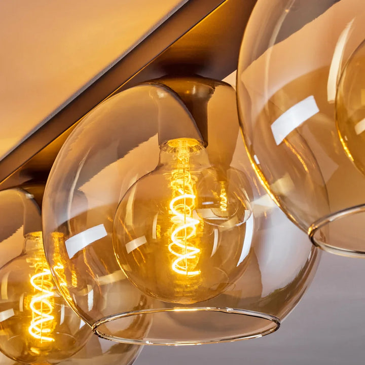 Modern Amber Glass Globe Ceiling Light - Bar Design