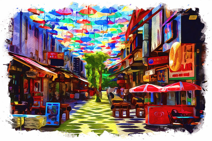 Wadi Home canvas print of a colorful street scene with many bright umbrellas overhead and shops lining the street.