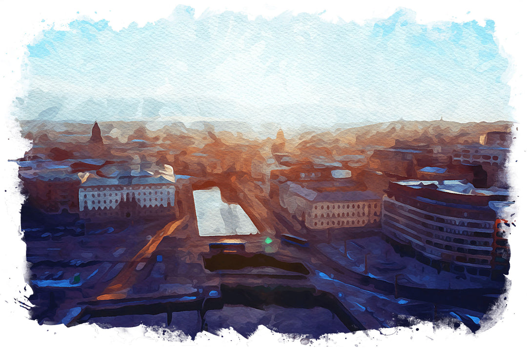 Wadi Home Cityscape Sunrise Watercolor Wall Art featuring a vibrant watercolor painting of a city at dawn with warm oranges and deep blues.