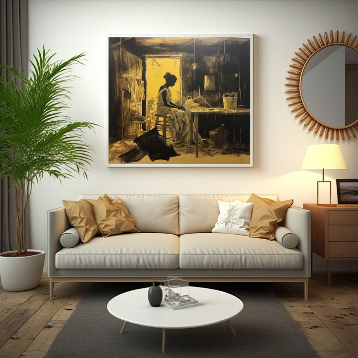 Wadi Home's Weaver's Solitude wall art depicts a woman weaving in a dimly lit room with ochre and black tones.
