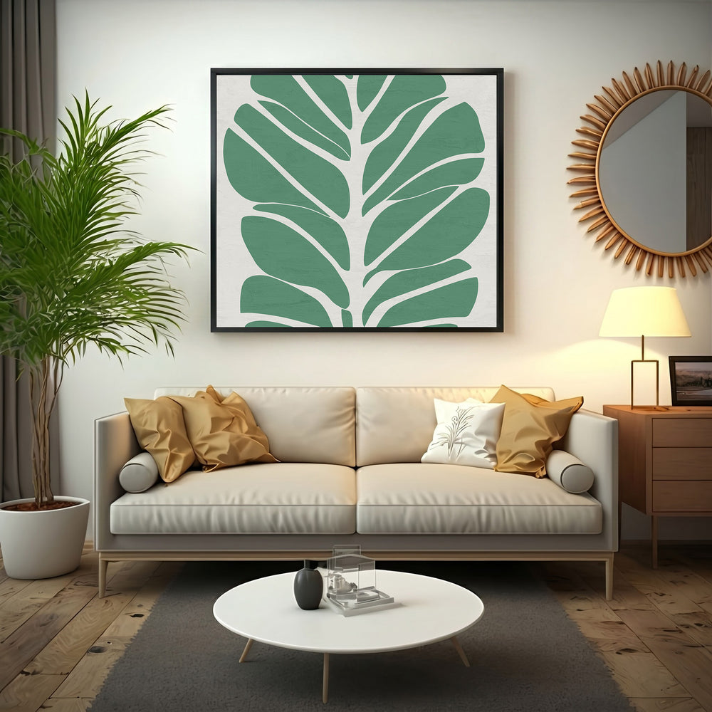 Wadi Home abstract botanical leaf wall art, minimalist green leaves on cream background, framed in black.
