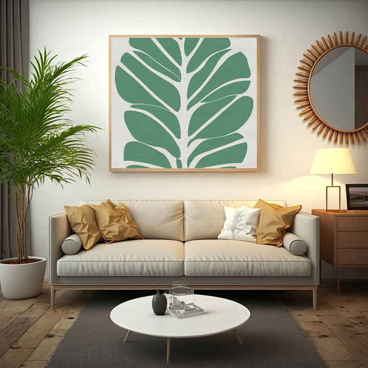 Wadi Home abstract green leaf wall art with a minimalist design on a neutral background, framed in light wood.