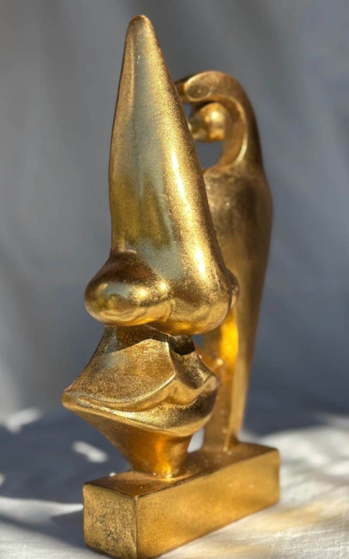Abstract Gold Face Sculptures
