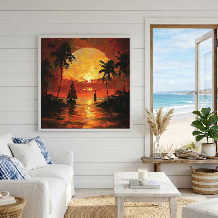 Wadi Home tropical sunset sailboat wall art with vibrant orange and yellow hues, palm trees, and two sailboats.
