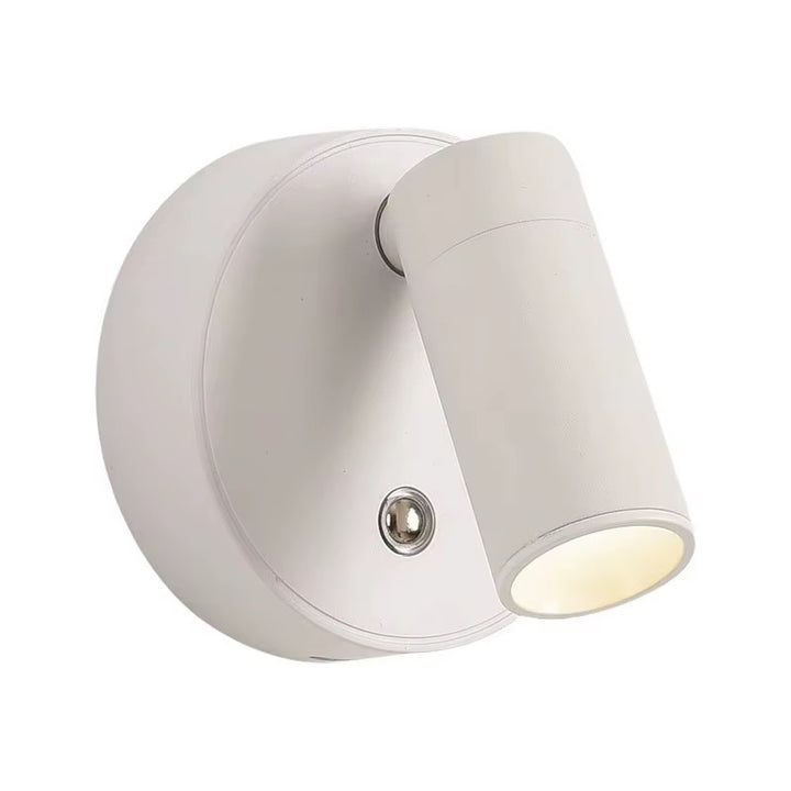 White wall-mounted spotlight with an adjustable cylindrical head and round base