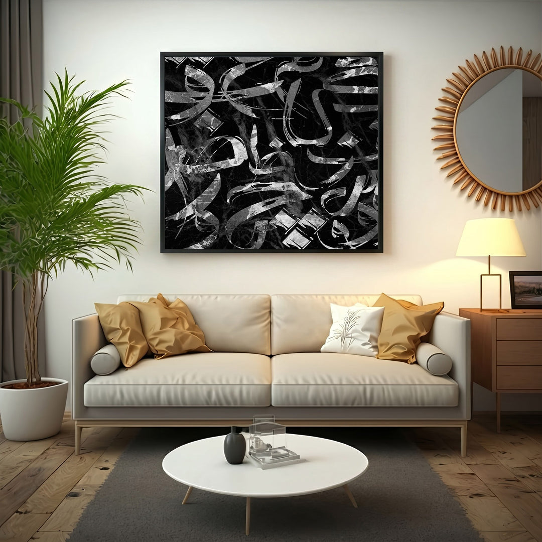 Wadi Home abstract calligraphy wall art with black and silver brushstrokes on a black marble background.