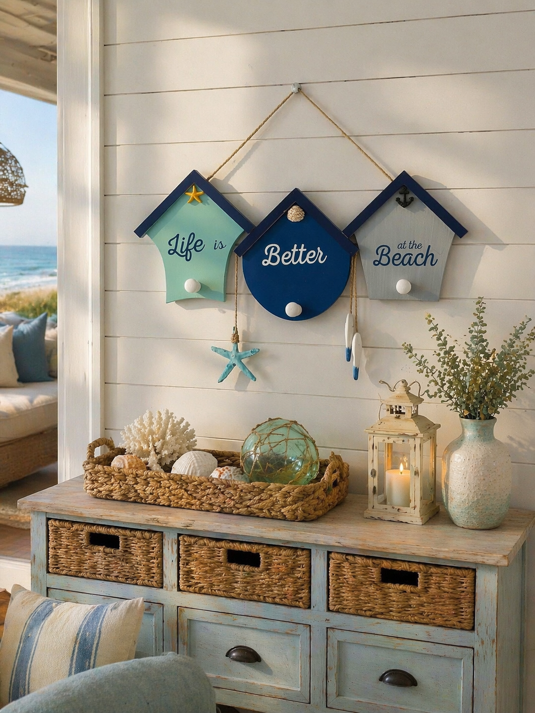 Nautical house wall decor with small house shapes and beach details