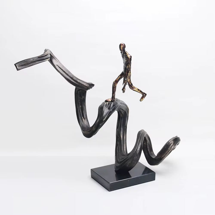 Abstract Walking Figure on Wave Sculpture