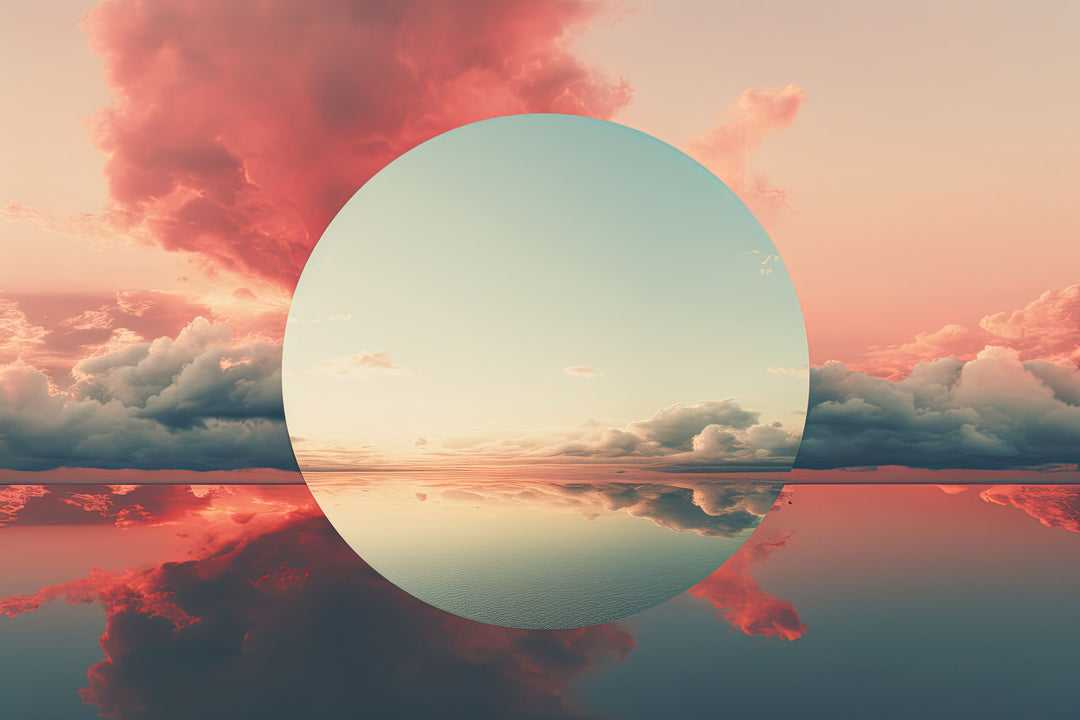 Wadi Home framed surreal sunset wall art with a circular sun over a reflective horizon in pink and blue tones.